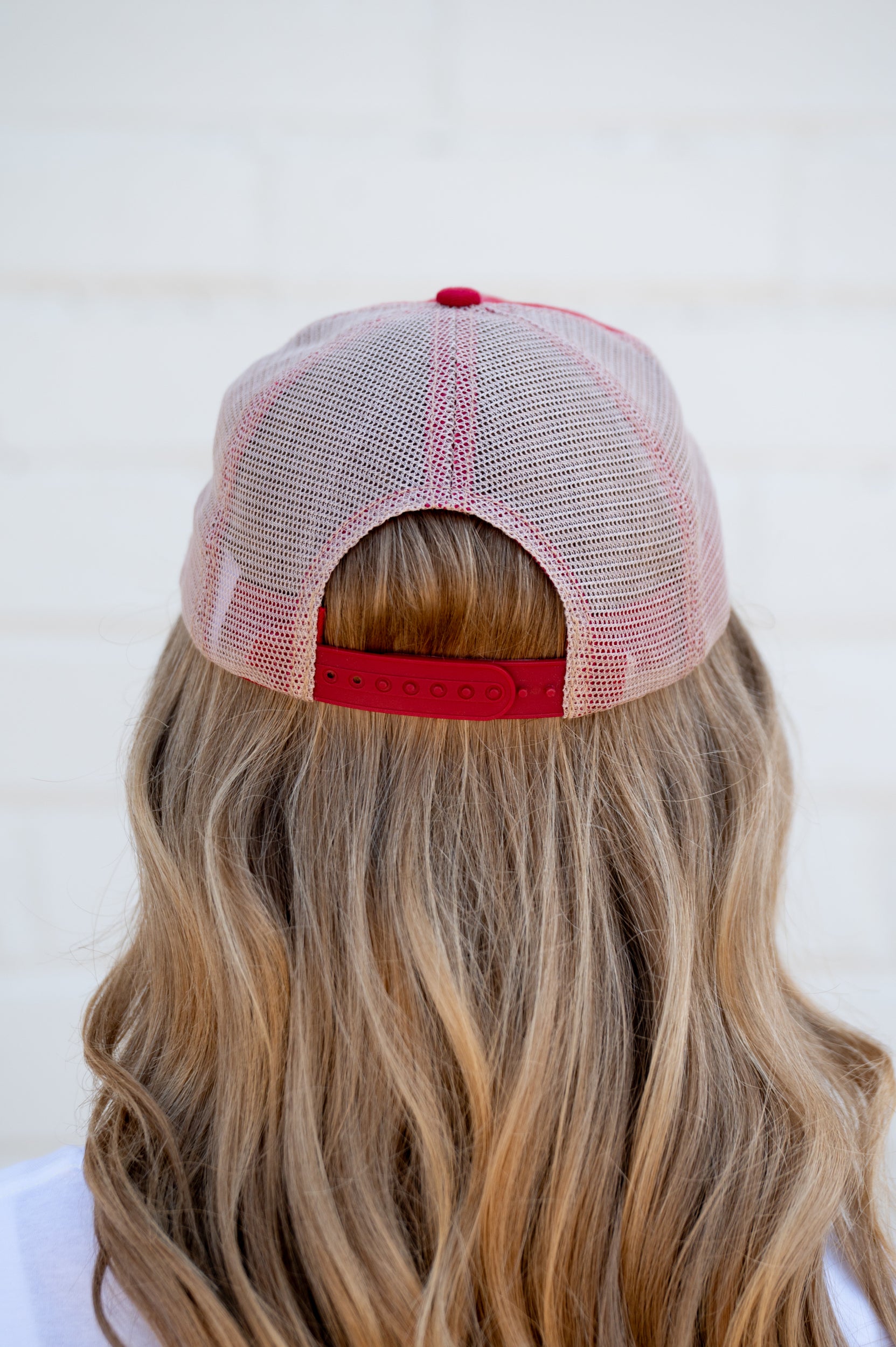 University of Alabama Red Hat Featuring a patch with an image of a fishing lure with Red text "Alabama"