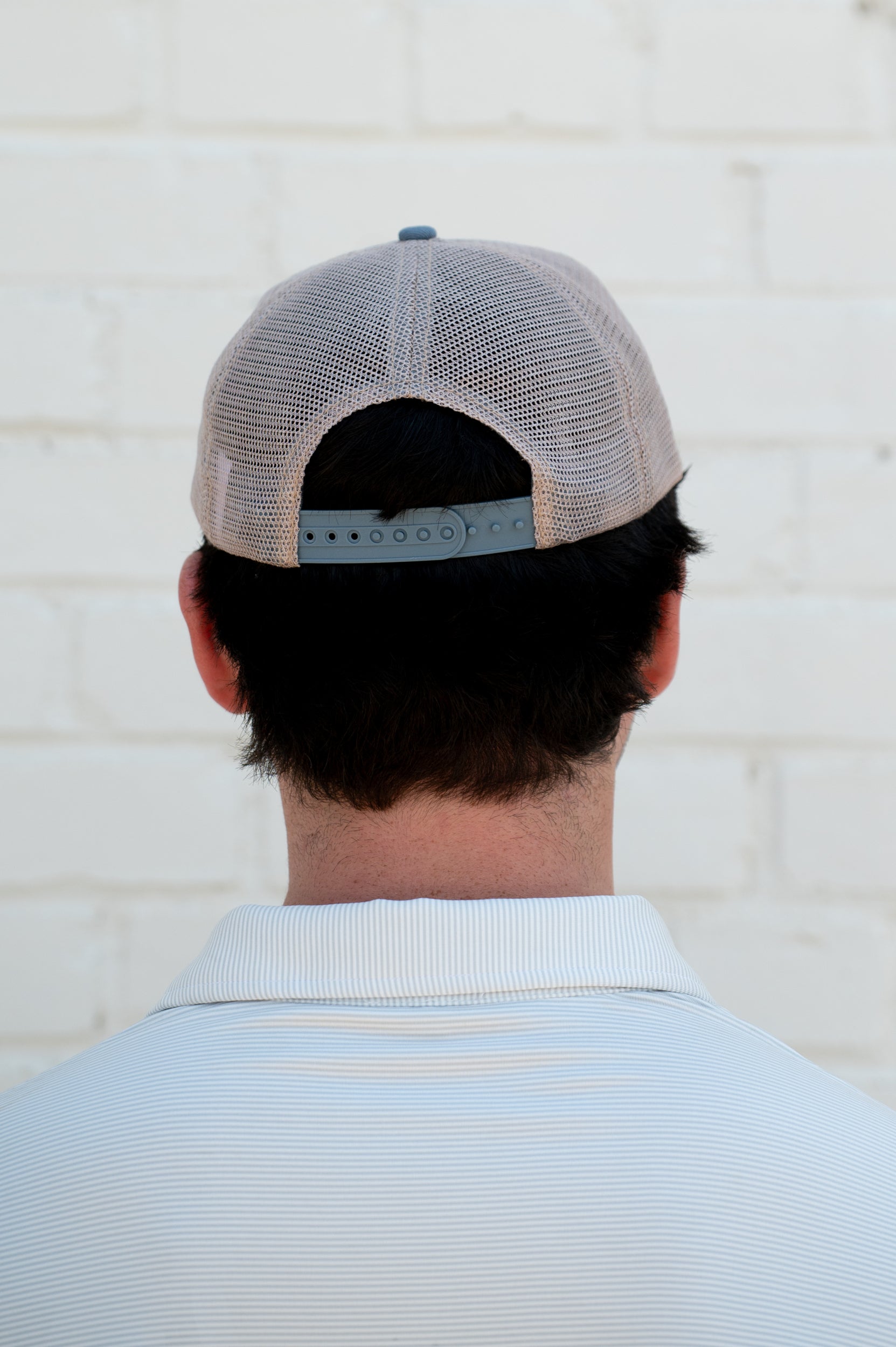 Auburn University Dusty Navy Hat featuring a patch with a tiger fishing lure with the Blue text “Auburn”