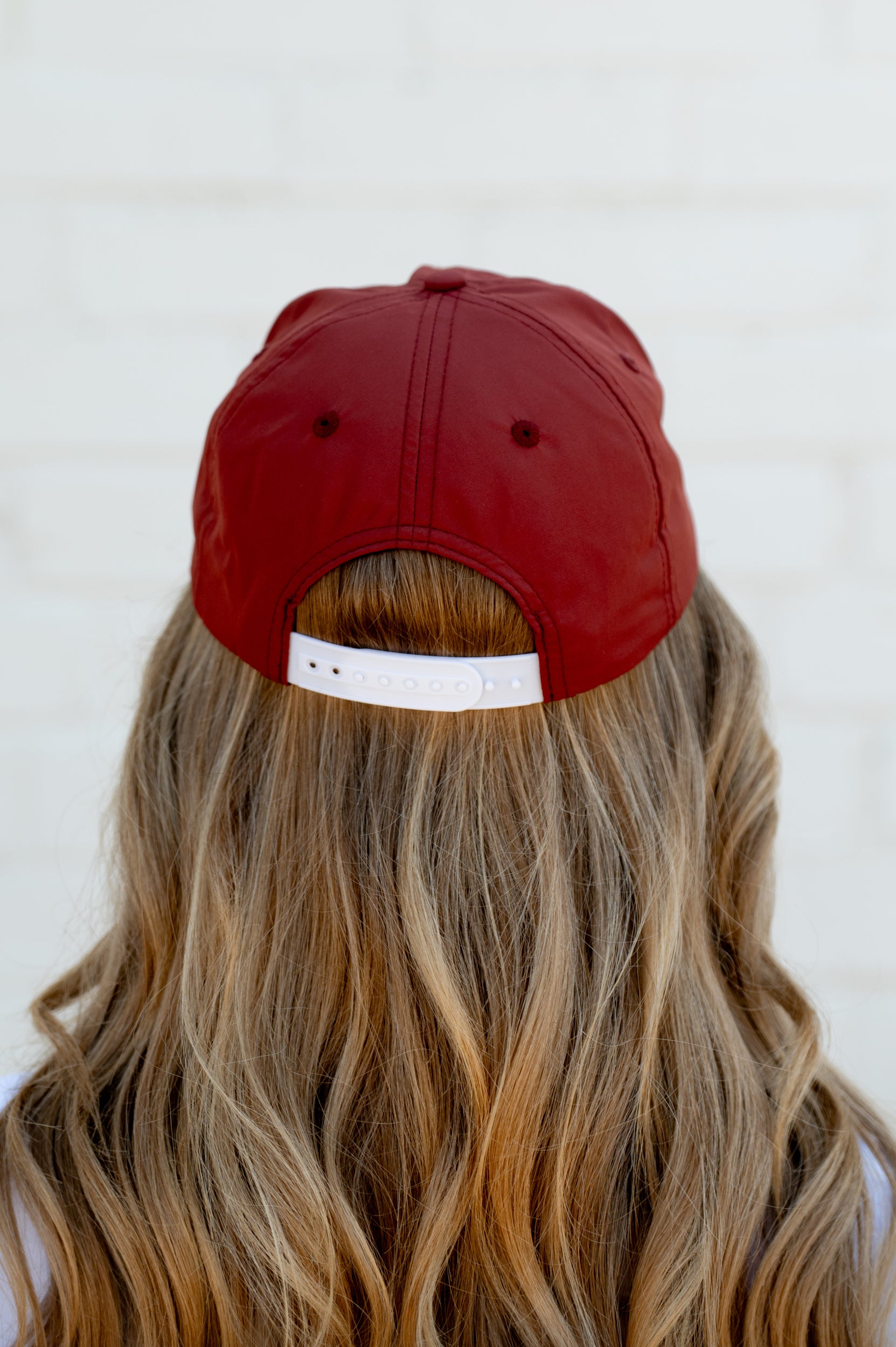 University of Alabama Dark Red Hat with a White rope and White script embroidery “Bama”