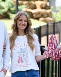 University of Alabama Ivory T-Shirt with Red text “Roll Tide” above an image of Big Al leaning on a Black A