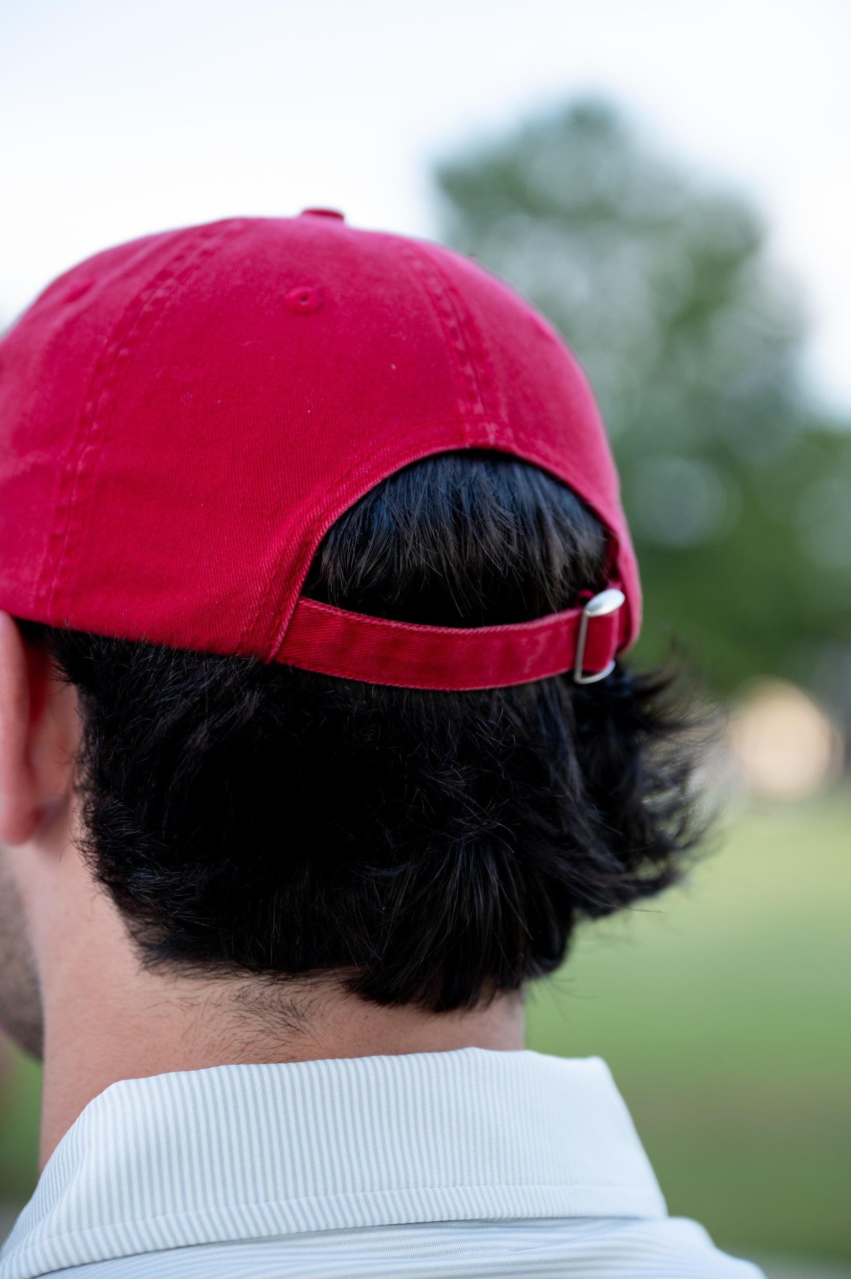 University of Alabama Red Dad Hat with an embroidered Big Al leaning on a Red Block A