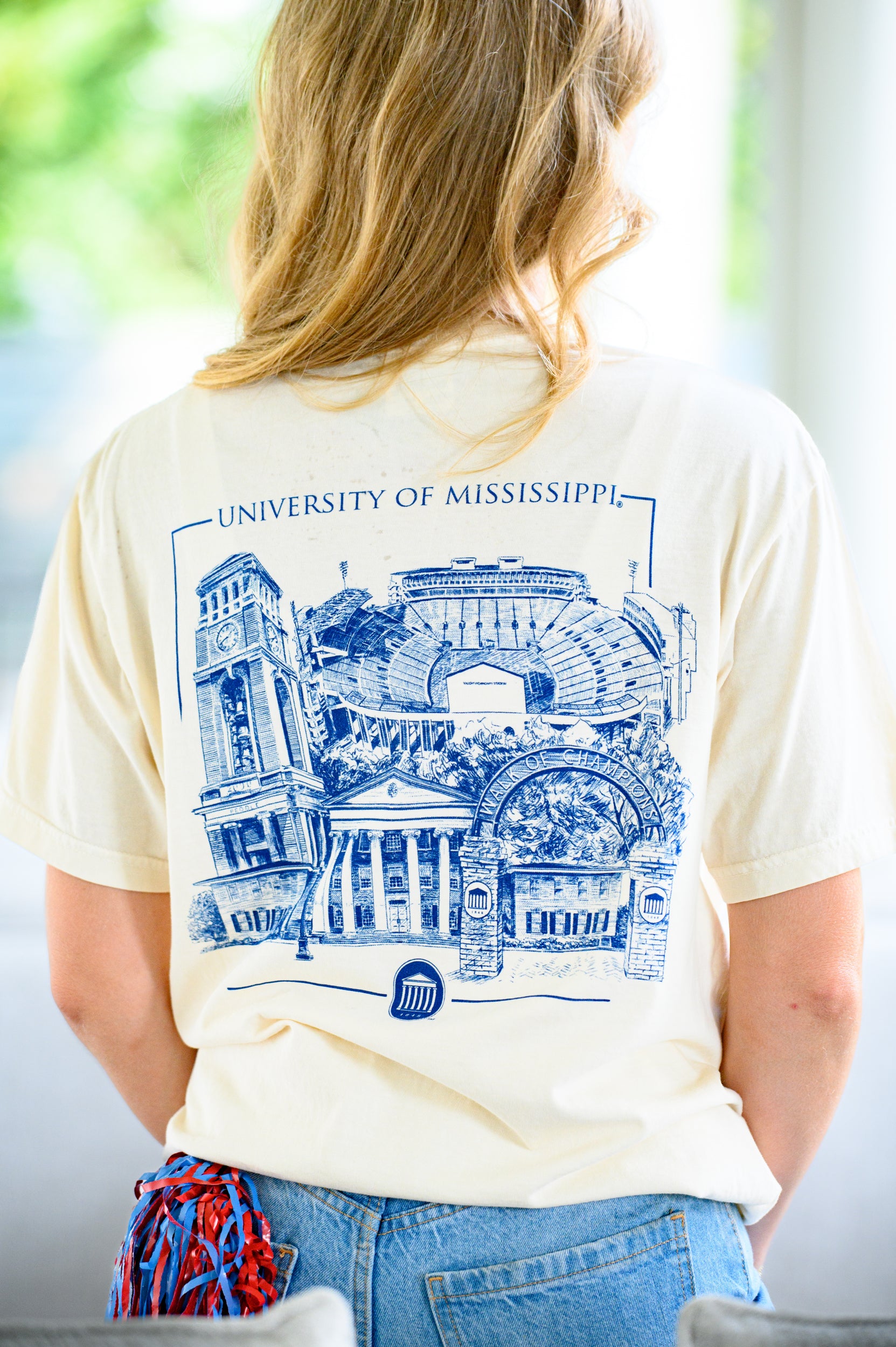 Ole Miss Ivory T-Shirt with an illustration of the campus’ most iconic landmarks