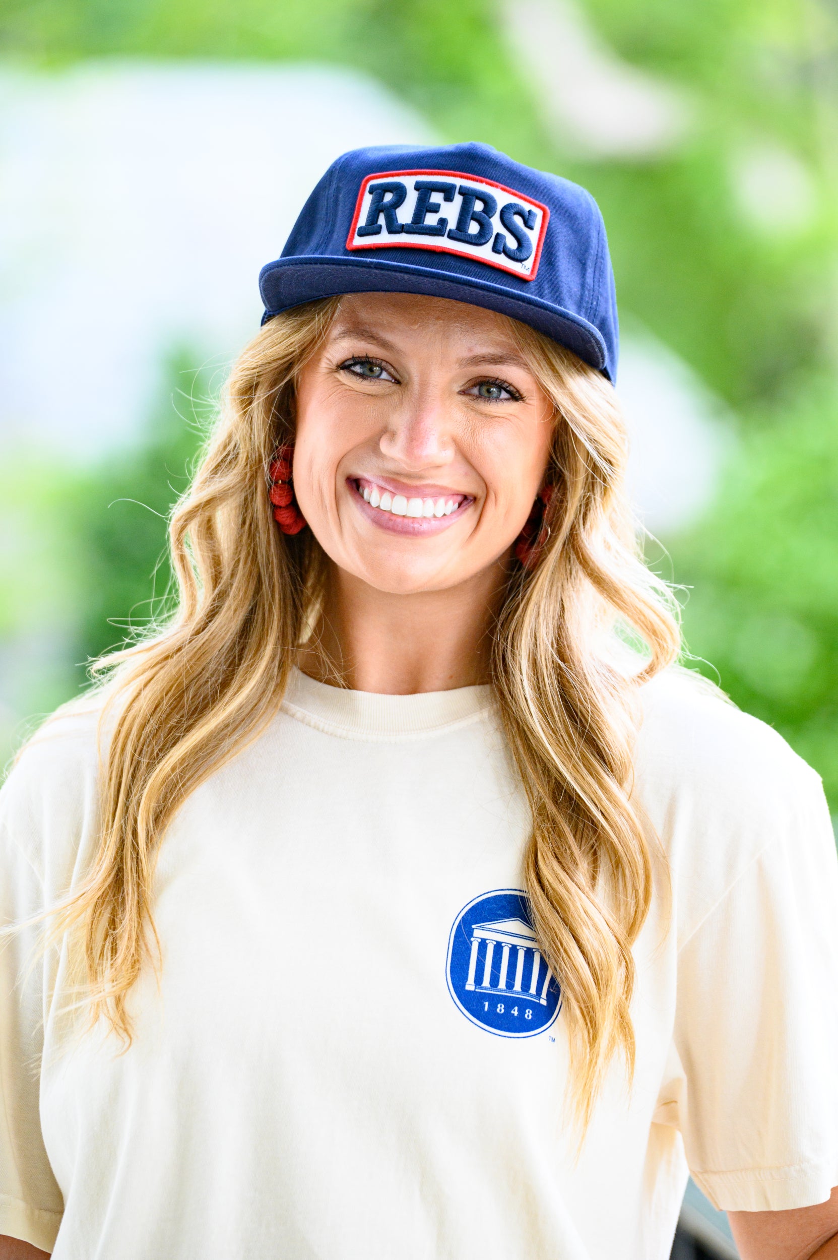 Ole Miss Ivory T-Shirt with an illustration of the campus’ most iconic landmarks