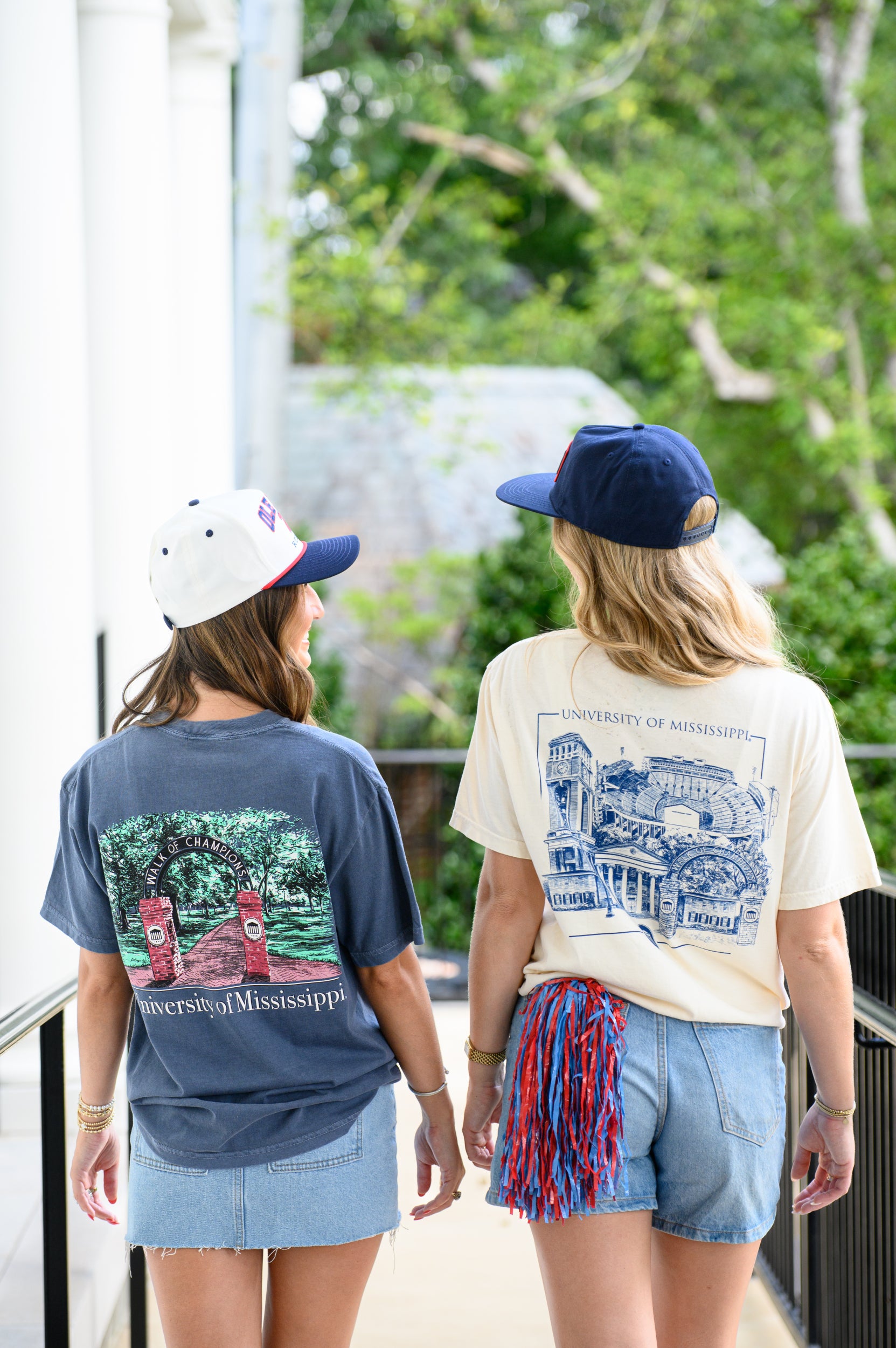 Ole Miss Dusty Navy T-Shirt with an illustration of the Mississippi University Walk of Champions
