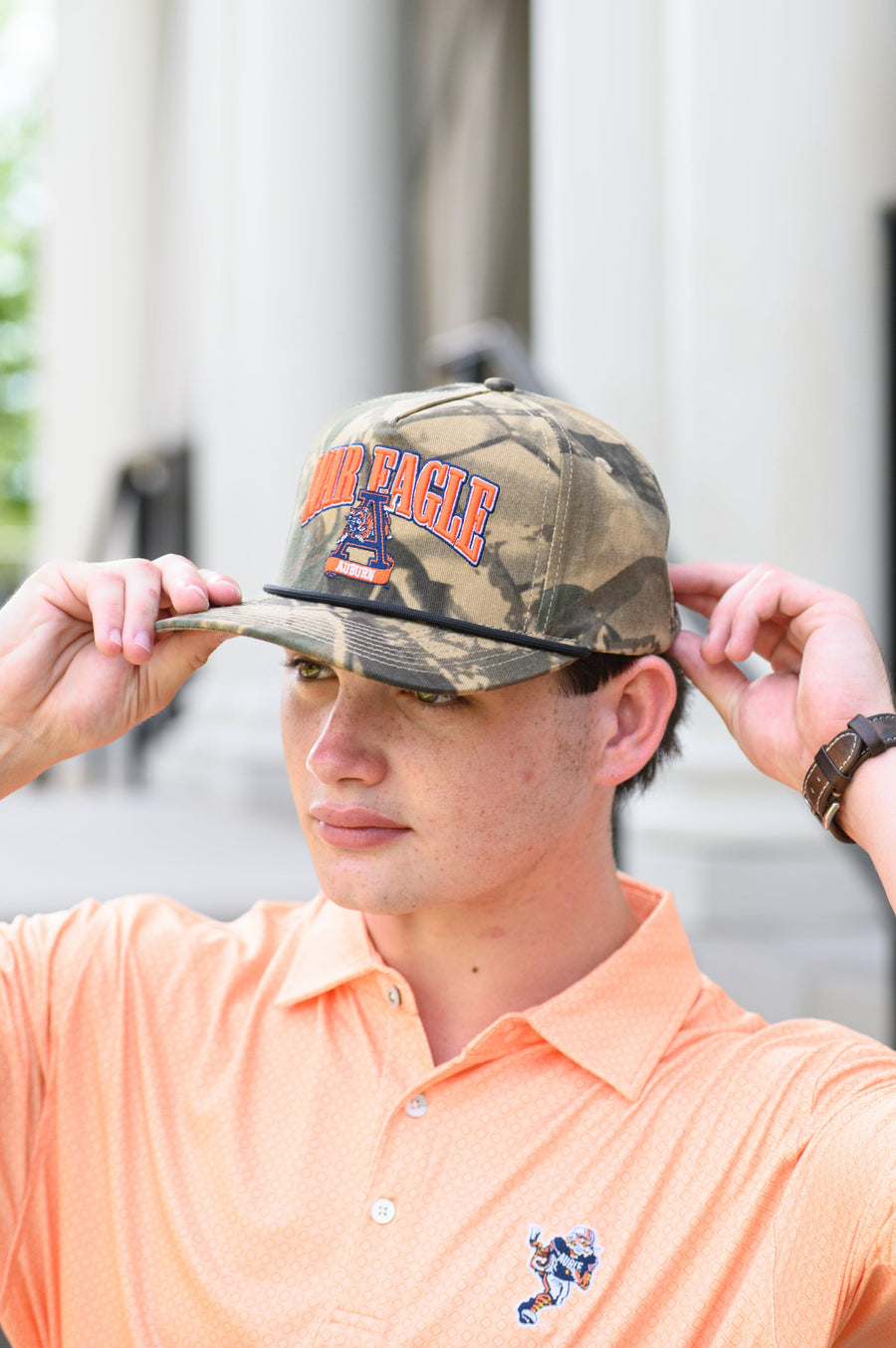 Auburn University Camouflage Hat with Orange text “War Eagle